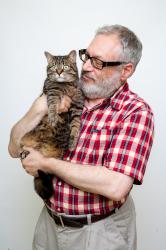 Cat Care Specialist from Summeridge Animal Clinic holding a cat